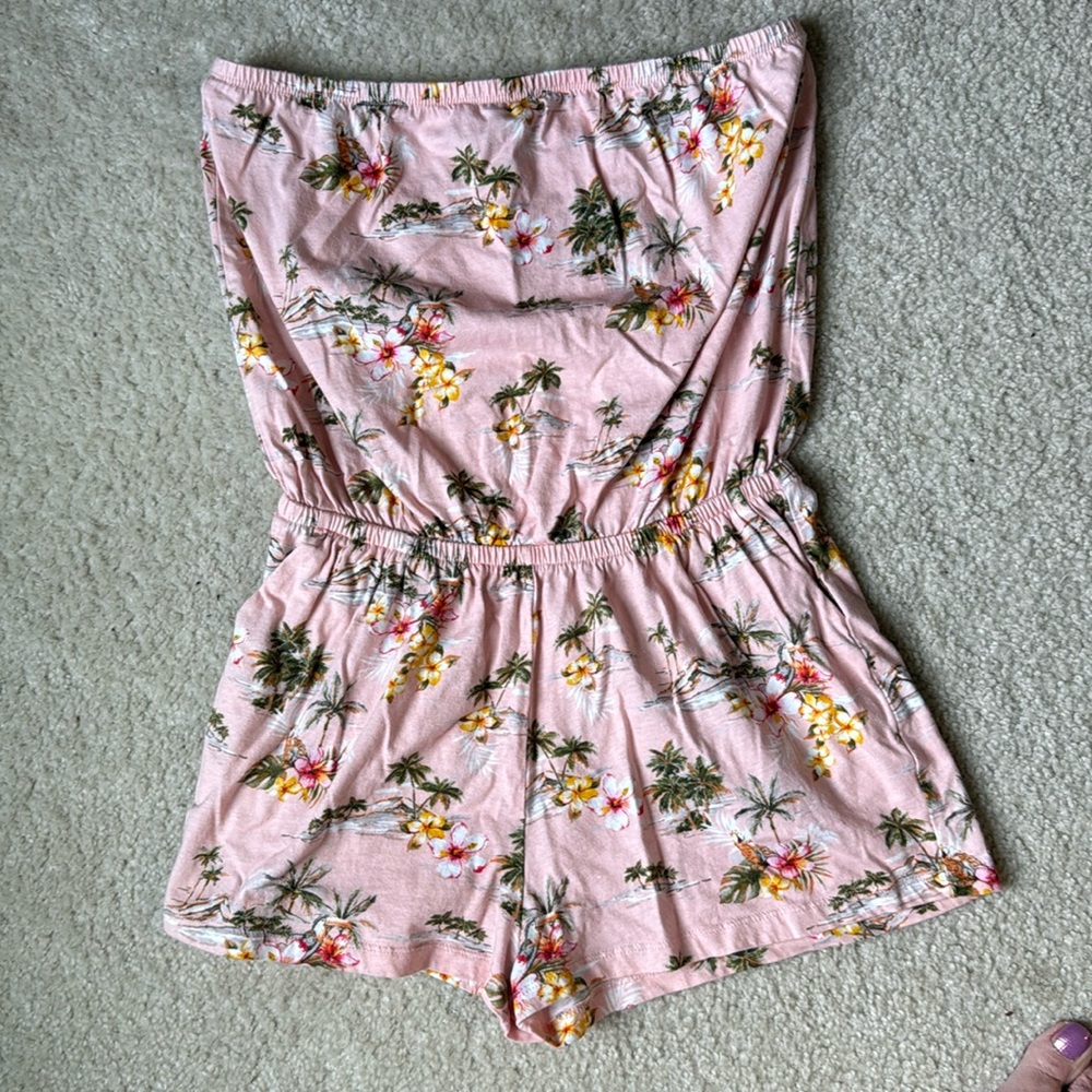 Pink sleeveless romper with pockets!